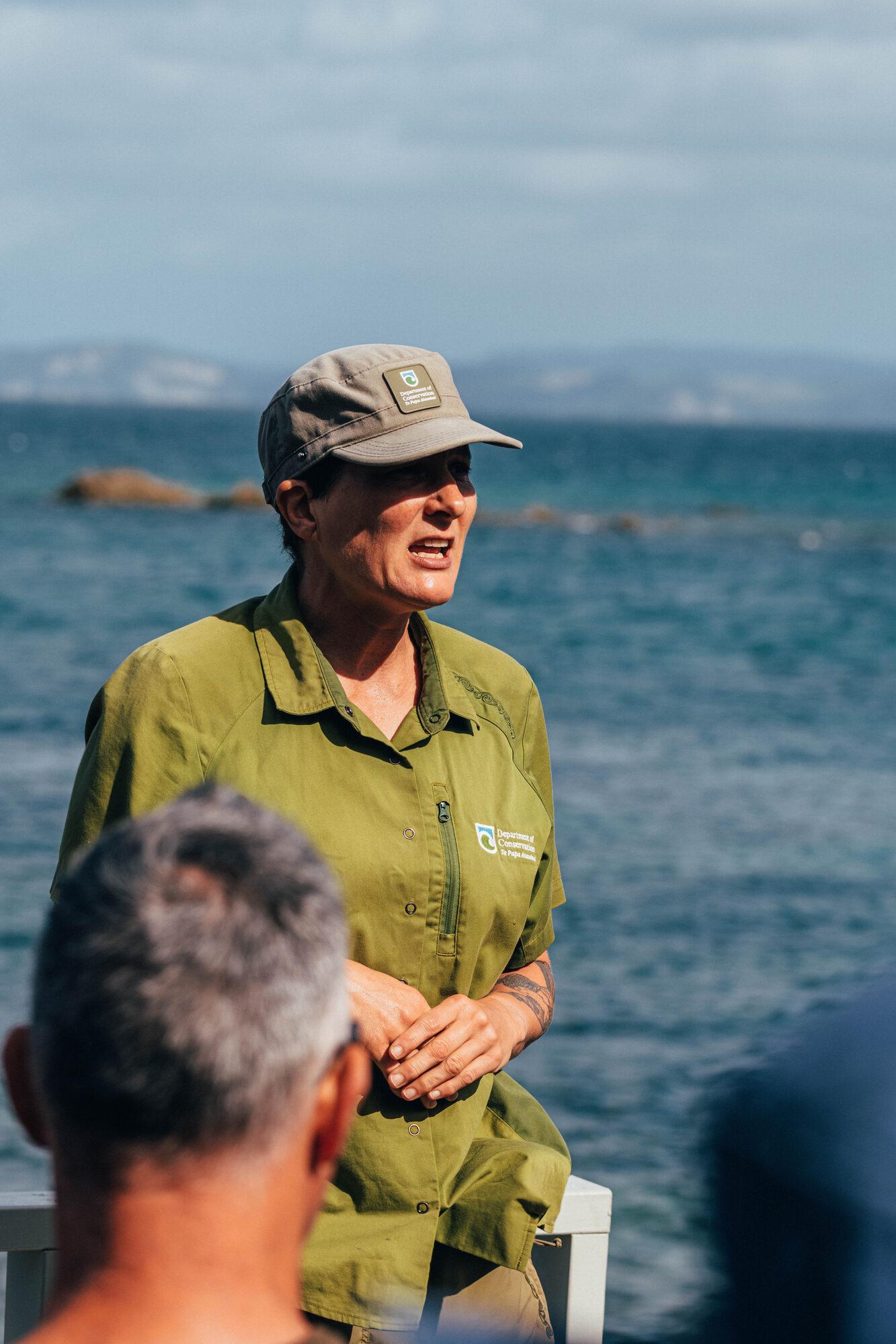 A guide in the field talking about native wildlife